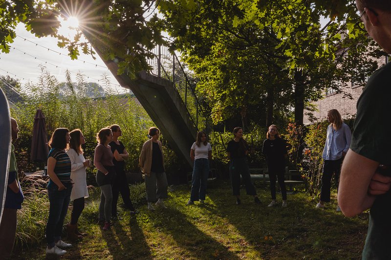 On Purpose Associates standing in a circle